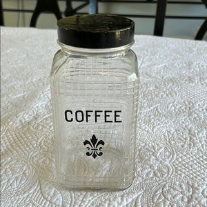 Vintage glass coffee jar with black lid